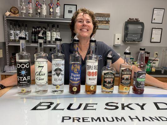 The owner, Kim, with the spirits they make