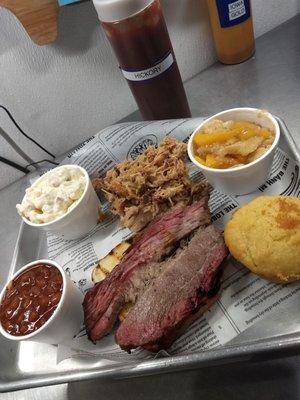 2 meat brisket and pulled pork with baked beans, potato salad, peach cobbler, and corn bread