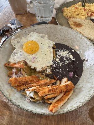 Chilaquiles with egg and chicken