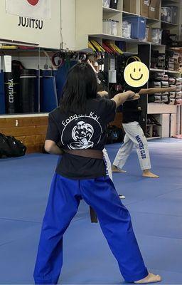 Poomsae practice in Fong-ra-Kai shirt!