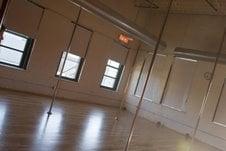 A Red Dance Studio...looks completely different when you take class--the walls are red, curtains drawn, lights are red, too!