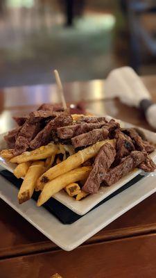 Appetizer green-chile fries with steak