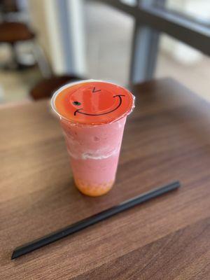 Strawberry smoothie drink w/ mango poppers