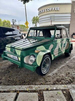 VW thing parked out front