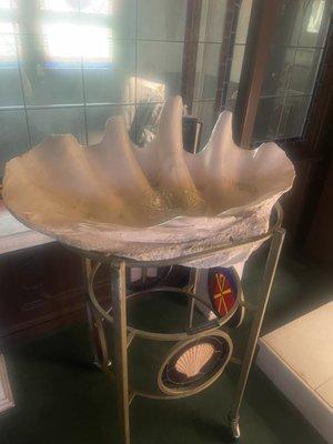 Baptism font made from giant clam... In Catholic typeology, sea shells are symbolic of everlasting life