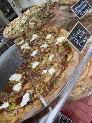 Sides of the day barbecue chicken pizza and spinach tomato pizza, and white pizza meat pizza buffalo chicken and pinwheels