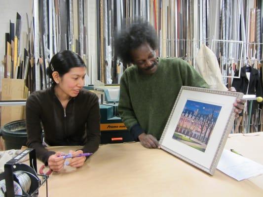 Jessica (13 years of framing experience and Interior Design & Engineering degrees) and Robert (25 years of framing experience)