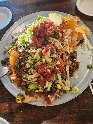 Trash Can Nachos are a must