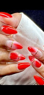 Acrylic nails with nail technician choice of design.