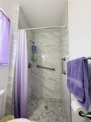 Petite good looking shower remodel. Glass doors are not the only option.