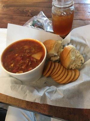 Chicken salad and a giant bowl of vegetable soup! Chocolate covered strawberry for a great ensemble!