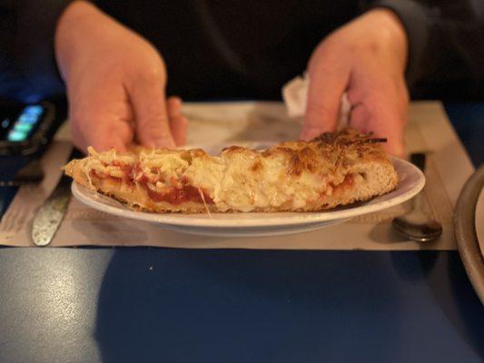 Slice of spaghetti pizza