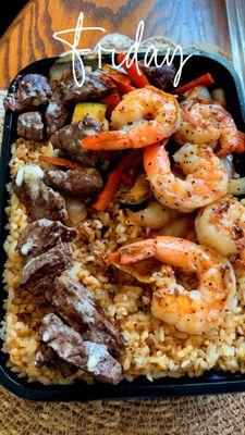 Filet Mignon & Shrimp   fried rice and veggies.