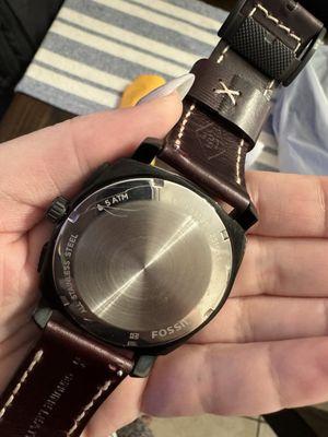 Scratched watch from their battery changing service