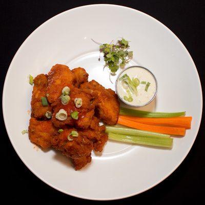 CHICKEN WINGS - Plain or in homemade buffalo sauce.