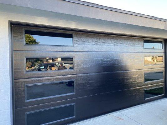 Insulated steel back door with windows on both side