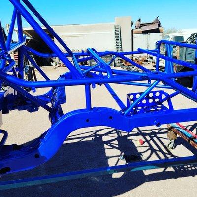 Stock car chassis powder coated in Illusion Blueberry with a clear coat.