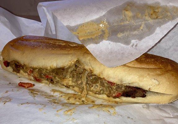 Cheesesteak with Whiz, Onions, and Red Peppers