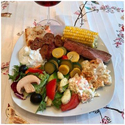 Grilled Sunday dinner for family -- steak and lamb sausage