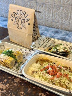 Chips, Street Corn, Burrito Box, and Brussel Sprout Taco.