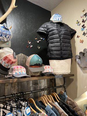 Designer puffy jacket and pistel hats.