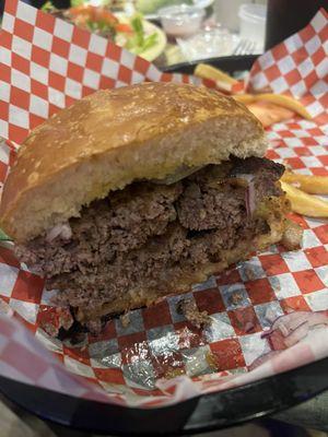 And here is my hamburger it was pretty big and when I picked it up, the juices were running out of the hamburger very juicy