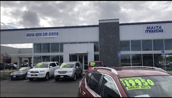 Maita used car center the front of our building with some of the cars we have for sale.