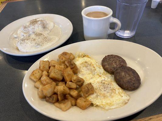 Eggs, sausage, potatoes, biscuits and gravy, coffee.