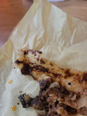 Oil puddle at the bottom of my burrito