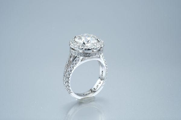 L.Trapp Custom Hand made Engagement Ring with French Cut pave Diamond Setting and Custom engraving.