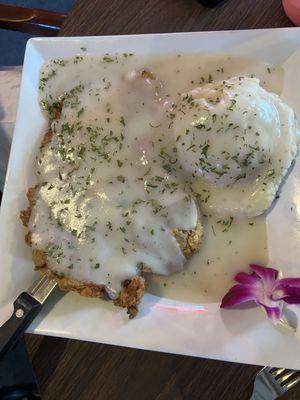 Chicken fried steak and mashed potatoes