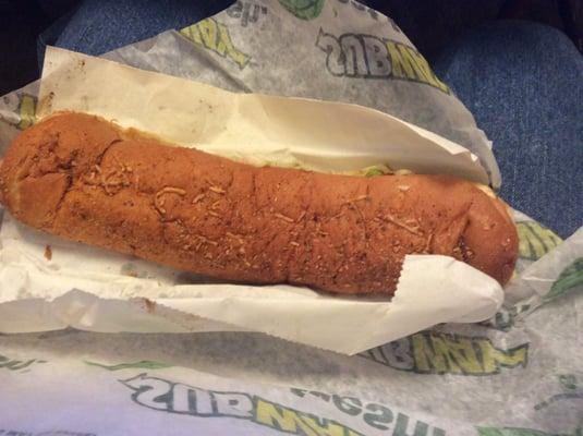 Foot-long sub on Italian herbs and cheese bread