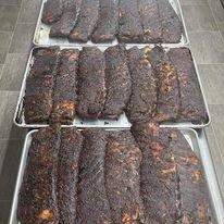 Ribs out of the smoker and going in the walk in cooler