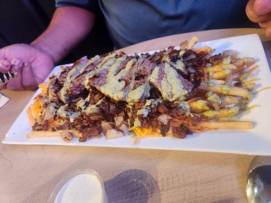 Dirty fries with a whole steak on top!