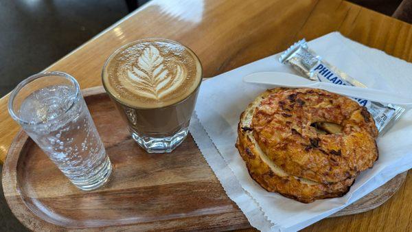 Cortado and pizza bagel