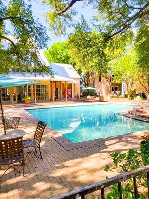 Pool with clubhouse in background