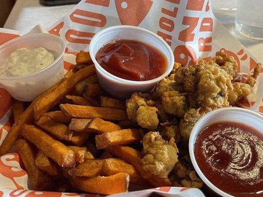 Fried oysters are sweet potato fries (this was actually served warm).