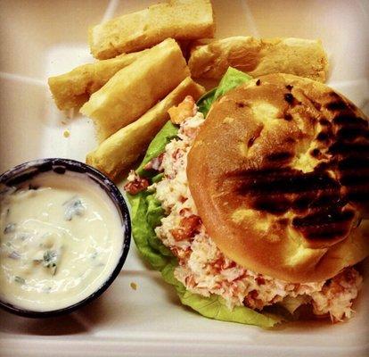 Lobster Sandwich on Brioche Bun with Fried Yuca and Cilantro Aioli