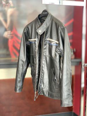 Bikers jacket altered...sleeves tapered and shortened, cuffs tapered, all the top stitches matched on sides and on cuffs back factory way.