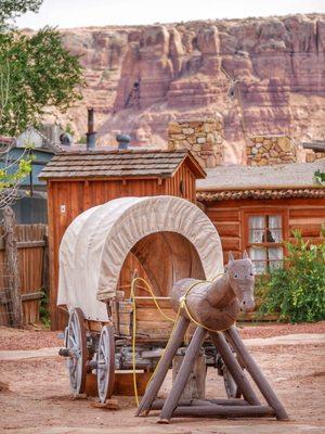 Wagon in front of cabins