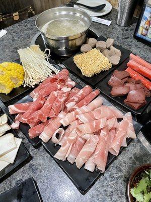 Assortment of meats, veggies and noodles