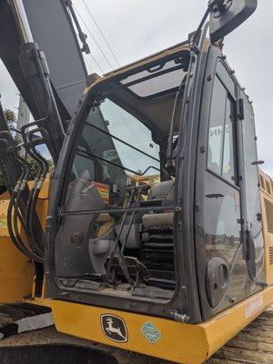 John Deere construction vehicle before replacement.