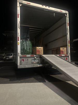 Unloading , even at night we work to get you settled in !