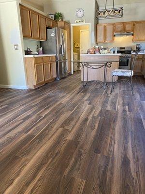 Beautiful LVP flooring installed by Atomic Construction