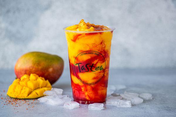 Chamango: Mango slushy with real mango chunks, adorned with chamoy and a sprinkle of tajin