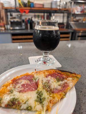 Flat bread pizza. Salami, cheese and pesto. Cinnamon Stout from Firestone.