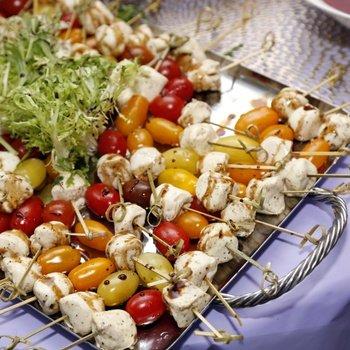 Tomato mozzarella skewers with  balsamic glaze and fresh basil