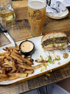 Burger with grilled onions and peppers