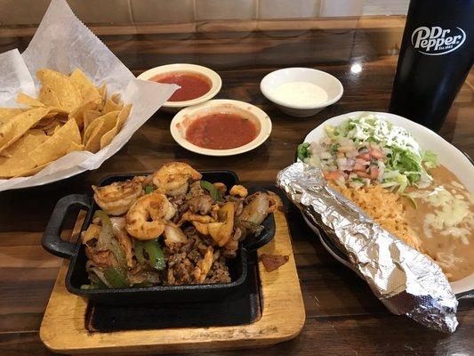 Lunch Texas fajitas and a drink. A lot of food!