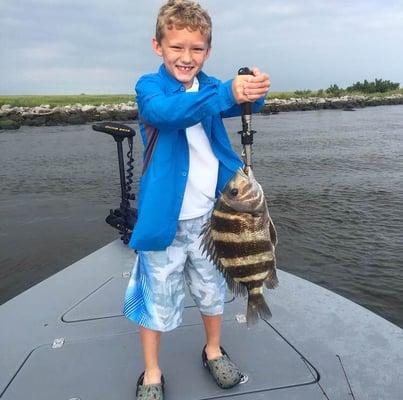 Landon's first "sheep fish", boy was he excited to catch the biggest fish of the day!